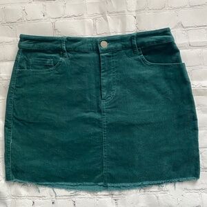 Forever 21 
Forest Green Corduroy Mini Skirt With Raw Edge, Size Medium no tags-